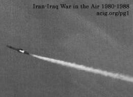The second stage of an Iraqi SA-2 telephone pole passes harmlessly in front of an Iranian RF-4E, which captured this hair-raising moment. (Authors collection)